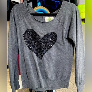 Small off the shoulder, gray sweatshirt with black heart